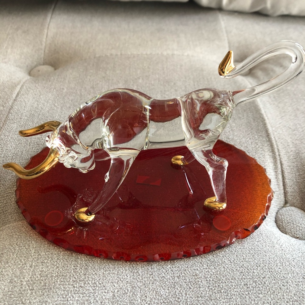Glass Bull Figurine with Gold Accents on Red Base